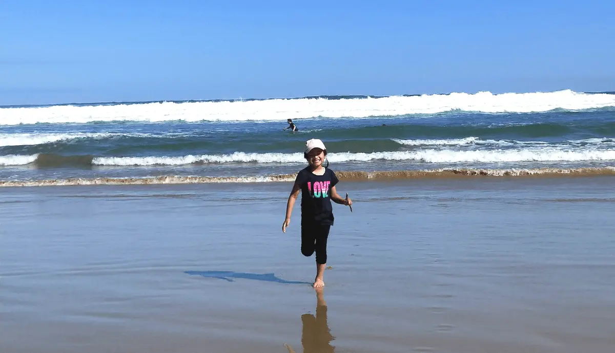 girl running on a beach